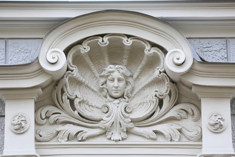 Head of a Woman in a shell above the entrance
