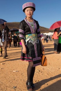 Young woman dressed in a traditional Hmong costume