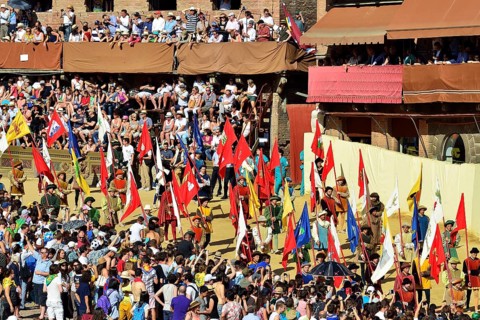 Festive parade before the historic horse race Palio di Siena