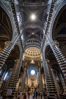 Interior with striped pillars and ornate ceiling