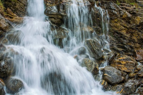 Waterfall at Lake Zufrittsee in Martelltal valley