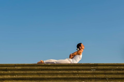 Young woman practising Hatha yoga