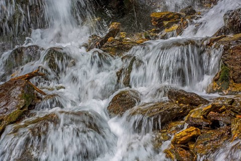 Waterfall at Lake Zufrittsee in Martelltal valley