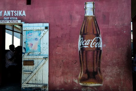 Coca Cola advertising and the open door of a restaurant