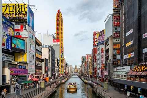Tourist boat on the Dotonbori canal