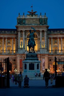 Hofburg Palace at Heldenplatz square with the equestrian monument of Archduke Charles