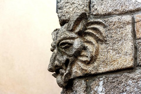 Sculpture of the Beast of Gevaudan on the wall