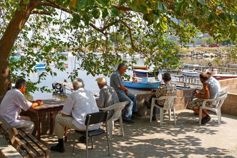 Men relaxing at the fishing port