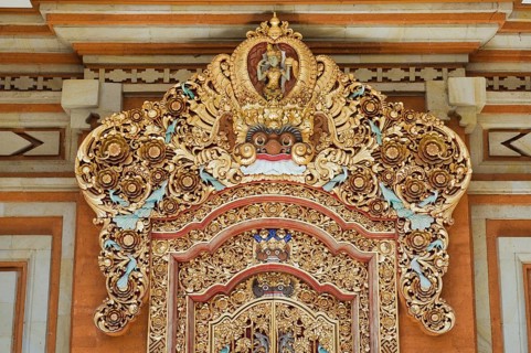 Wooden door decorated with carvings