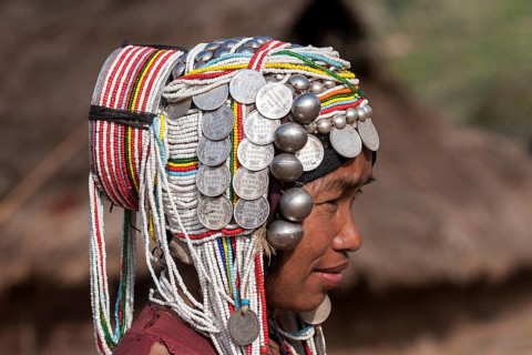 Elderly woman of the Akha ethnic group with traditional headdress