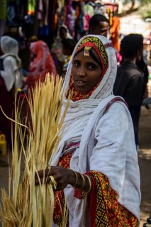 Woman shopping on the colourful Monday market of Keren