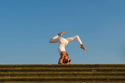 Young woman practising Hatha yoga
