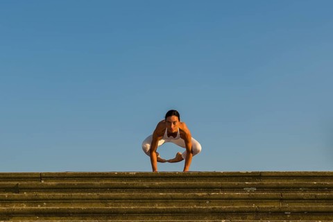Young woman practising Hatha yoga