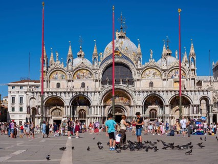 Basilica St. Mark in St. Mark's Square filled with tourists