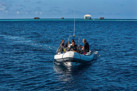 Divers in rubber boat