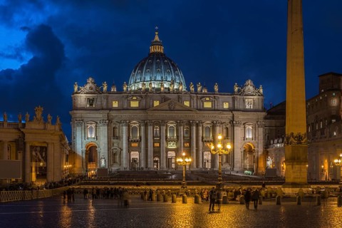 St. Peter's Square with St. Peter's Basilica and obelisk at night