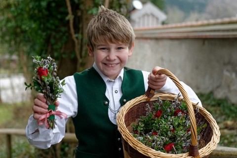 Boy with palm branches