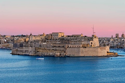 View from Valletta of the fortress Fort St. Angelo in the centre of the Grand Harbour