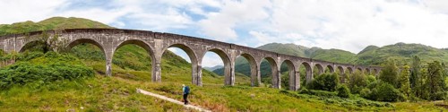 Hiker under Glenfinnan Viaduct