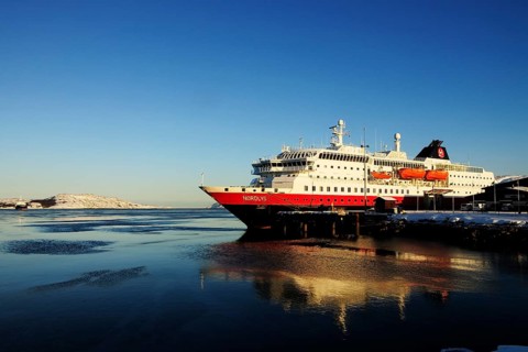 The Hurtigruten post ship MS Nordlys docked in the port of Kirkenes