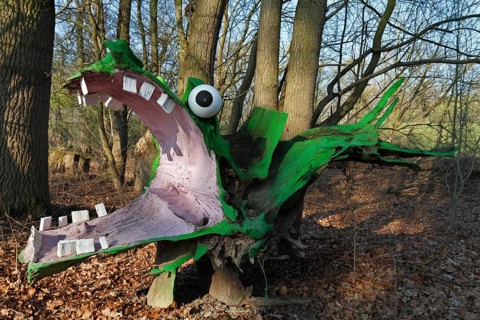 Green Dragon sculpture made from a painted tree root