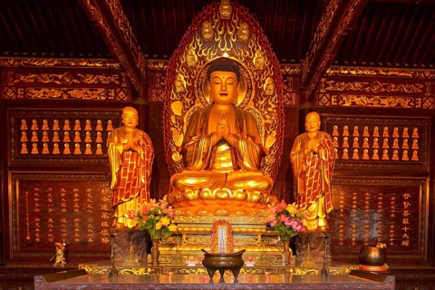 Golden Buddha statue and relics inside the Giant Wild Goose Pagoda