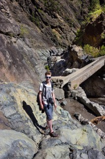 Young man on a hiking trail in the Caldera de Taburiente