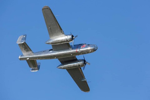 A B-25 Mitchell flying in a flight display during the Red Bull Air Race