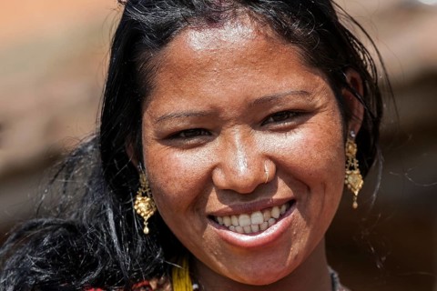 Nepalese woman with earrings and nose piercing