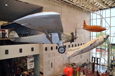 Spirit of St. Louis airplane and Space Ship One hanging from ceiling