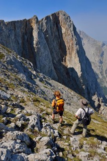 Two hikers on a trail near Kom Vasojevicki peak