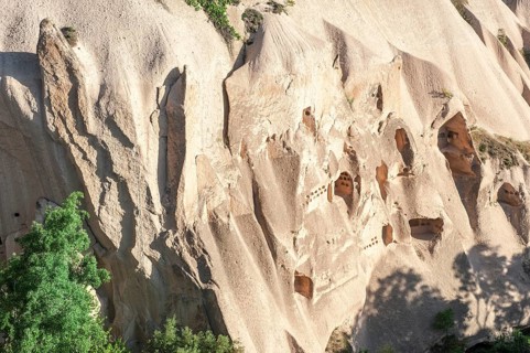Houses digged in sandstone cliff
