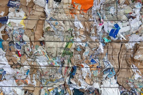 Pressed waste paper and cardboard
