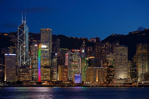 View at the blue hour from Kowloon on Hong Kong Island's skyline on Hong Kong River