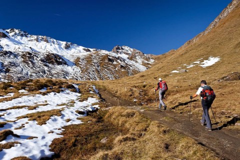 Mountain climbers ascending Wilde Kreuzspitze Mountain in the Pfunderer Mountains