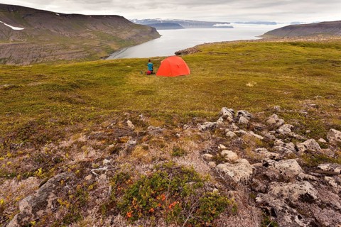 Young woman with a tent