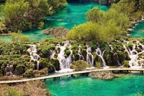 Cascades of water running over the travertine deposits between the lakes of Plitvice