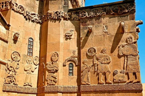 Bas relief sculptures with scenes from the Bible on the outside of the 10th century Armenian Orthodox cathedral of the Holy Cross on Akdamar Island