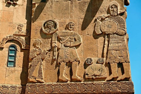 Bas-relief sculptures with scenes from the Bible on the outside of the 10th century Armenian Orthodox Cathedral of the Holy Cross on Akdamar Island