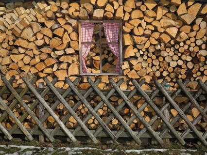 Fake windows in a stack of firewood