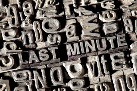 Old lead letters forming the words 'LAST MINUTE'
