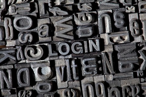 Old lead letters forming the word "LOGIN"