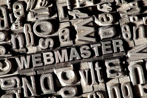 Old lead letters forming the word WEBMASTER