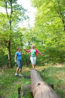 Women exercising on an outdoor fitness trail