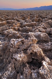 Salt crusts at the Devil's Golf Course at sunset