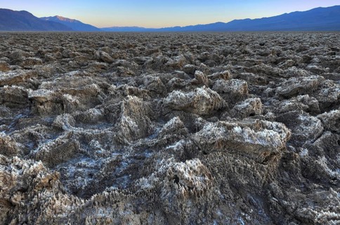 Salt crusts at the Devil's Golf Course at sunset