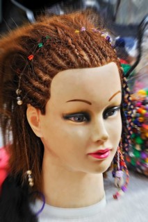 Head of a fashion doll with braids