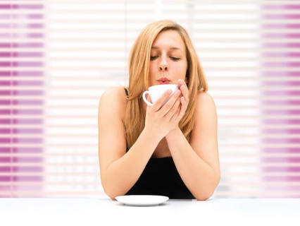 Woman drinking coffee