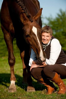 Woman with a Hanoverian horse