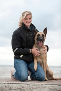 Woman with a Hollandse Herdershond